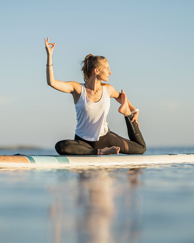 SUP Yoga Benefits on Paddleboards | TAHE Watersports – Tahe Sport